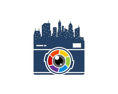 Modern camera with rainbow lens and building