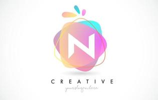 N Letter Logo Design with Vibrant Colorful Splash rounded shapes. Pink and Blue Orange abstract Design Letter Icon Vector. vector