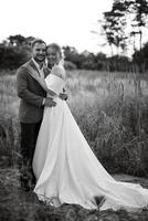 bride and groom on in the woods photo