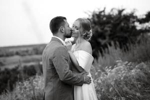 bride and groom on in the woods photo