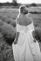 the bride in a white dress  on the lavender field photo