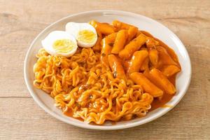 Rabokki or Ramen or Korean instant noodle and Tteokbokki in spicy korean sauce photo