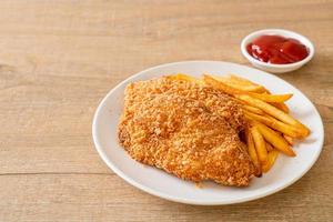 fried chicken breast fillet steak with french fries photo