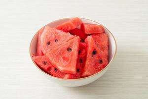 fresh watermelon sliced  in  bowl photo