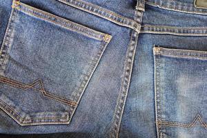 Dark blue jeans close up, Close up shot of denim jeans photo