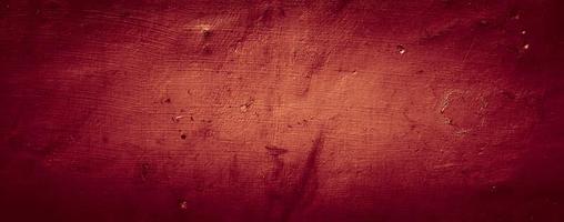 dark red grunge abstract texture background of wall cement concrete photo