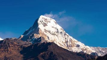 Timelapse with zoom motion of south face of mount Annapurna South in Nepal