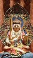 Buddha statue. Buddhist sculpture. images of chinese buddha photo