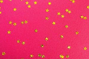 Red background in gold stars. Close up photo