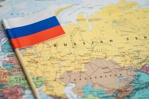 Bangkok, Thailand - October 7, 2021 Russia flag on world map background. photo