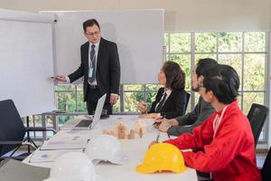 Team business meeting or workshop for development company investment real estate photo