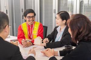 Happy people business team talking discussion construction project photo