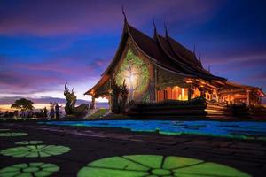 Temple Sirindhorn Wararam Phuproud at night in Ubon Ratchathani Province,Thailand.The famous public temple of buddhism for tourist. photo