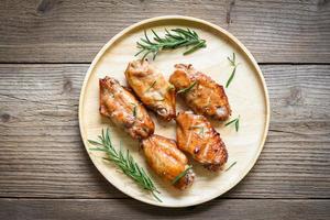 Baked chicken wings with sauce and herbs and spices cooking thai asian food rosemary chicken grilled