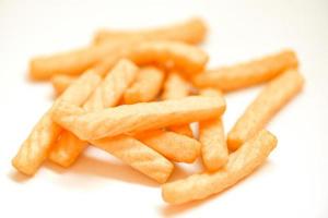 prawn crackers stick isolated on white background - homemade crunchy prawn crackers or shrimp crisp traditional snack photo