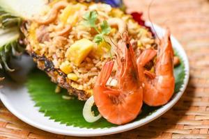 fried rice shrimp and fruits pineapple on plate asian food in thai - delicious menu shrimps prawns cooked photo