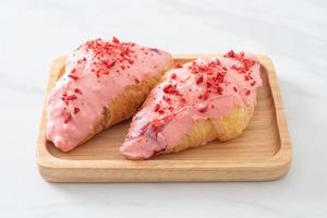 croissant with strawberry chocolate sauce photo