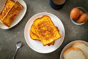 french toast on white plate photo