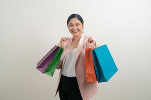 mujer asiática, tenencia, bolsa de compras, en, mano foto