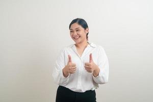 Asian woman with thumb up white background photo