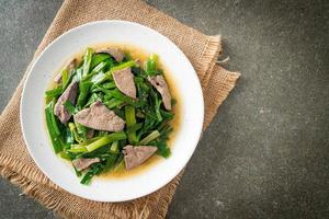 Stir-fried onion flower stem with pork liver photo