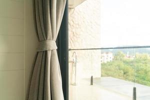 curtain with window and sunlight photo