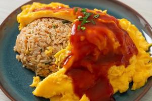 Flavored Fried Rice in an Omelet Wrapping photo