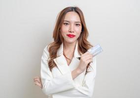 portrait beautiful Asian woman holding credit card photo