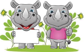 The couple of rhino is holding the blank banner and giving the thumb up in the garden vector