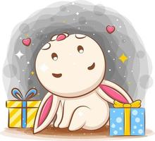 Cute rabbit feeling happy with two gifts