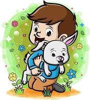 A boy playing with rabbit in the garden vector