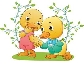 The happy cute duck couple are kneeling and using the good suit and dress in the park vector