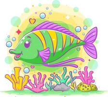 Cute green surgeon fish poses above the colorful coral reefs vector