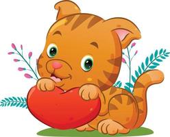 The little cat is holding the little love doll on her hand on the flowers park vector