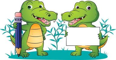 The couple student of the crocodile is holding the pencil and the blank board vector