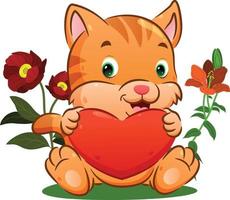 The cute kitten is holding a big heart on his hands in the flowers park vector