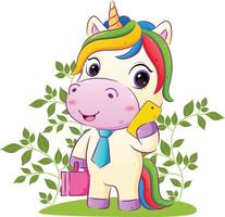 The happy unicorn is holding a suite bag and phone in the garden vector