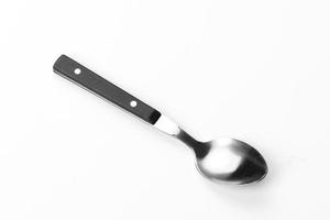 Beautiful teaspoon isolated on a white background. Cutlery on a white background photo