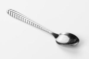 Beautiful teaspoon isolated on a white background. Cutlery on a white background photo