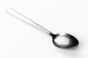 Beautiful teaspoon isolated on a white background. Cutlery on a white background photo