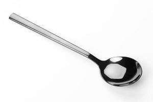 Beautiful tablespoon isolated on a white background photo