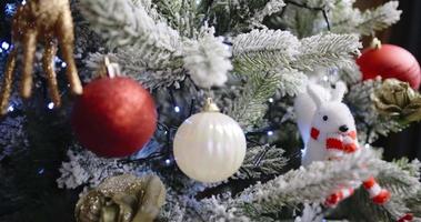 Christmas Tree. Decorated Christmas tree on blurred, sparkling and fairy background. New Year City Decoration. video