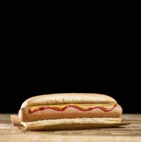 front view hot dog black copy space background