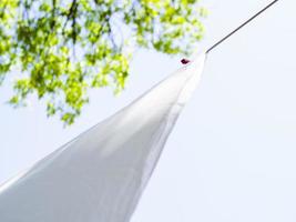close up white sheet drying line