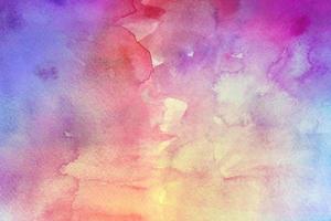 abstract light pink and purple watercolor hand painted stroke sky and clouds color splashing paper. photo