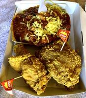 Fresh delicious crispy fried chicken golden brown with on white box. photo