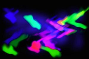 colorful abstract magic blur light texture rainbow reflective on black. photo