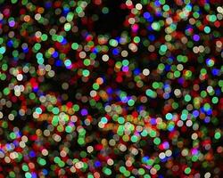 rainbow colorful blur christmas lights background.abstract Lights unfocused blur light dots black . photo