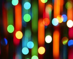 rainbow colorful blur christmas lights background.abstract Lights unfocused blur light dots black . photo