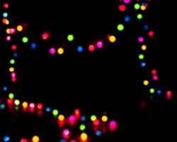 rainbow colorful blur christmas lights background.abstract Lights unfocused blur light dots black . photo